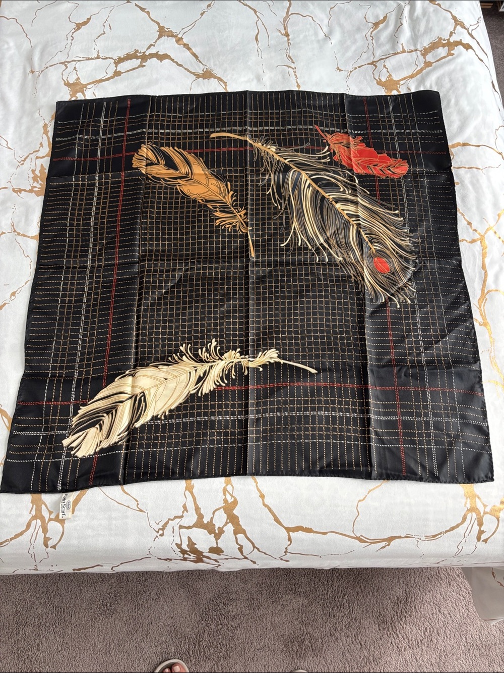 Totes Black Scarf with Gold and Red Feather Motifs